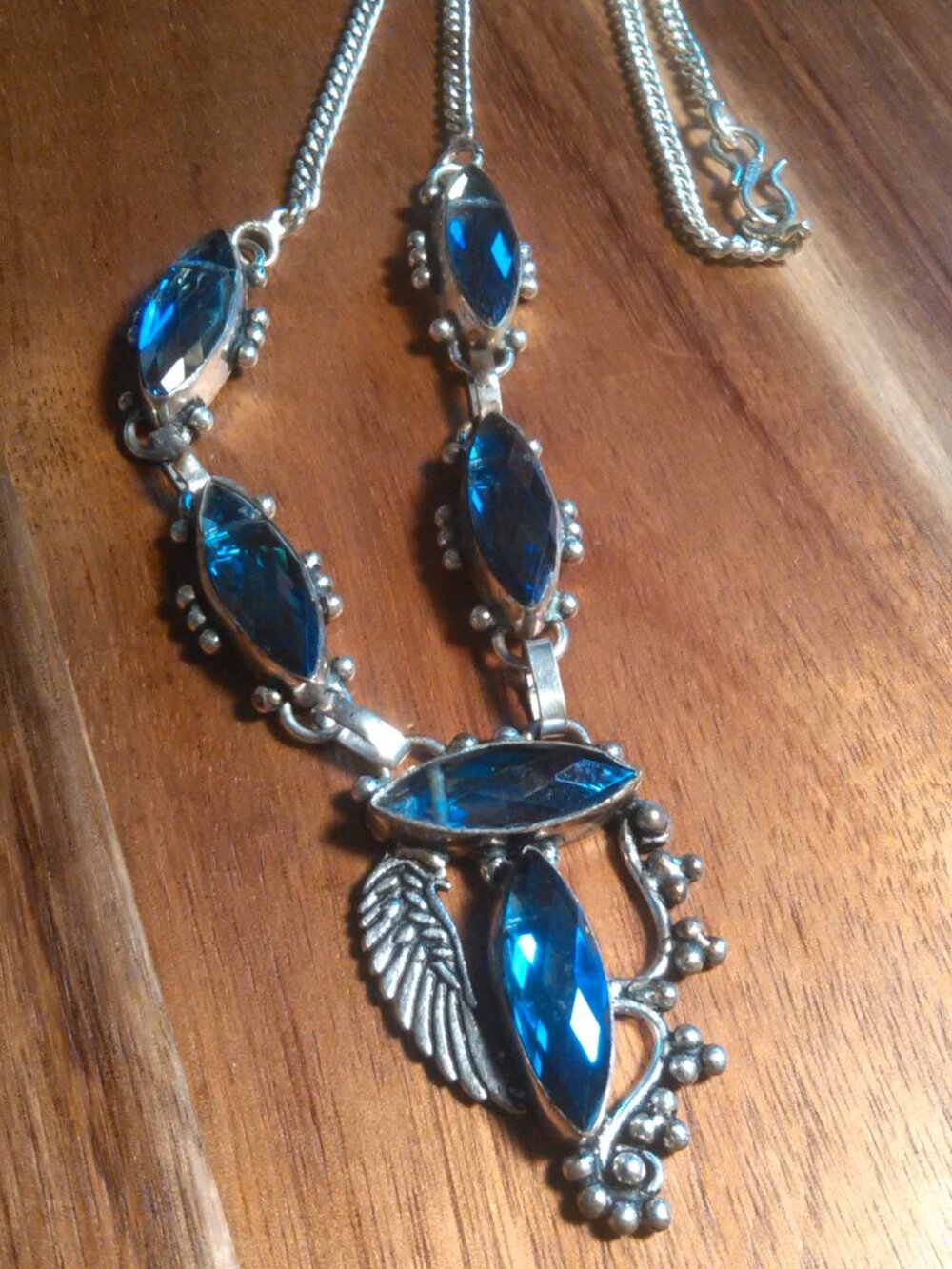 Faceted Blue Stone Five Stone Wing Design Necklace (18 Inch)